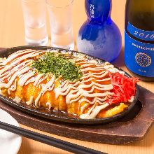 Tonpei-yaki (stir-fried cabbage and meat topped with egg)