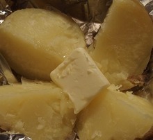 Steamed potatoes with butter