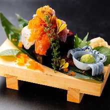 Overflowing seafood sushi