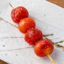 Wrapped tomato skewer