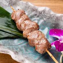 Grilled pork cheek skewer