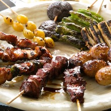 Assorted grilled chicken skewers