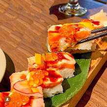 Seared salmon rod-shaped sushi