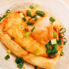 Fried tofu pouch stuffed with natto (fermented soybeans)