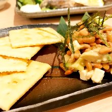 Avocado, natto (fermented soybeans), and cream cheese with crackers