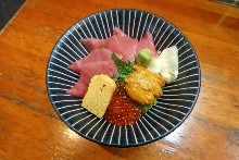 Medium fatty tuna, salmon roe, and sea urchin rice bowl