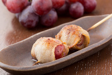 Pork belly-wrapped grape skewer