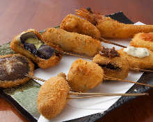 Assorted fried skewers