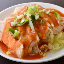 Steamed chicken topped with green onion sauce