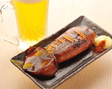 Squid poppo-yaki (Grilled squid mantle stuffed with squid tentacles and entrails)