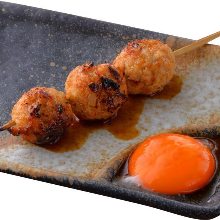 Grilled meatball skewer with egg yolk