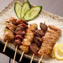 Assorted grilled chicken skewers