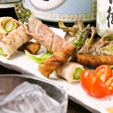 Pork wrapped asparagus skewer