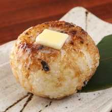 Grilled rice ball with soy sauce and butter
