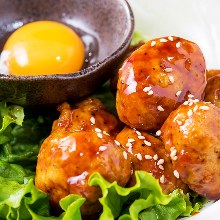 Meatballs served with egg yolk