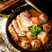 Steamed Wagyu beef meatballs and egg tagine