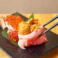 Fatty Wagyu beef and sea urchin gunkan sushi rolls