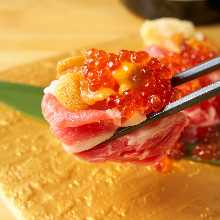 Overflowing sea urchin sushi
