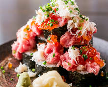 Overflowing seafood sushi