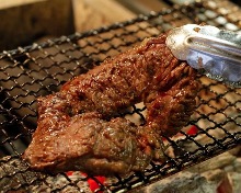 Charcoal grilled meat