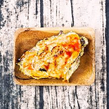 Grilled oysters with cheese