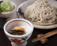 Buckwheat noodles with a raw egg and grated yam