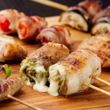 Assorted grilled vegetable roll skewers