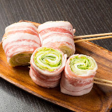 Grilled pork wrapped lettuce skewer