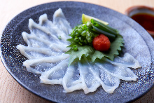 Thinly sliced pufferfish sashimi
