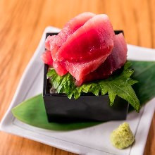 Chopped tuna served in a masu (Japanese wooden square measuring cup)