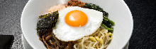 Bibimbap topped with sunny-side-up egg