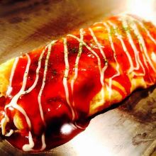 Tonpei-yaki (stir-fried cabbage and meat topped with egg)