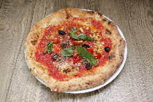 Olive, tomato, and anchovy pizza
