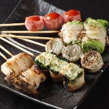 Assorted grilled vegetable roll skewers