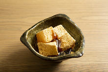 Warabimochi (bracken-starch dumpling covered in sweet, toasted soybean flour)
