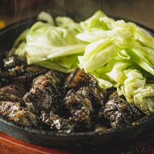 Grilled locally raised chicken thigh