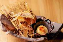 Charcoal-seared ray fin