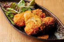 Crab cream croquette and sea urchinsauce