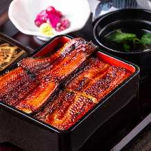 Extra premium eel served over rice in a lacquered box