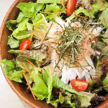 Salad mizuna and daikon radish with cod roe dressing