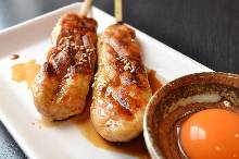 Grilled meatball skewer with egg yolk