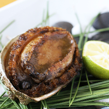 Grilled live abalone