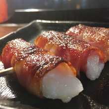 Grilled bacon and mochi skewers