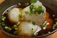 Deep-fried rice cake in broth