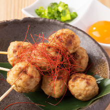 Meatballs served with egg yolk