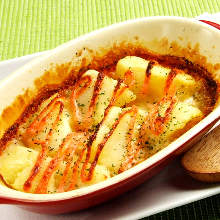 Grilled potatoes and marinated cod roe with cheese