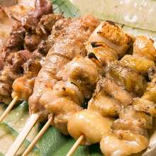 Assorted grilled chicken skewers