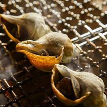 Grilled live whelk