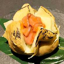 Potatoes topped with salt-fermented squid