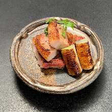 Herb-fed pork and green onions